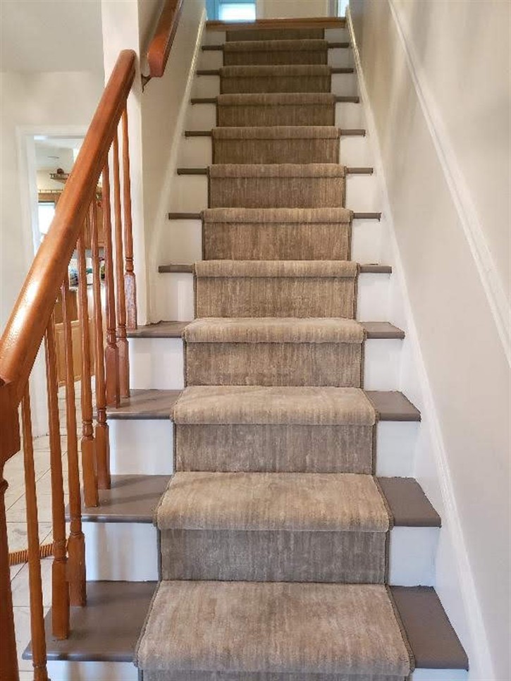 Transform your staircase with a high-end, woven stair runner, designed to make a statement. Custom rugs for steps, perfectly tailored to your interior design. Keywords: Designer stair runners, custom stair design, woven carpet for stairs, luxury stair design, Bucks County stair runners, unique stair carpets, stylish stair runners.